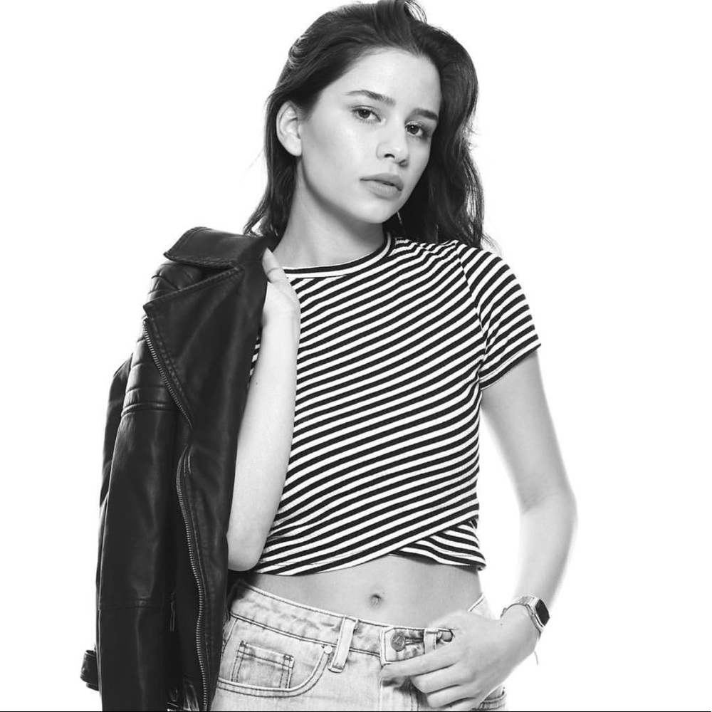 Black and white striped top.
